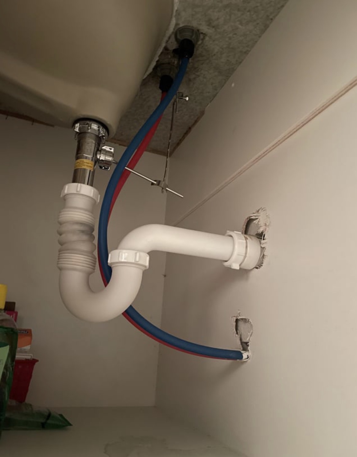 Sink drain and water supply plumbing